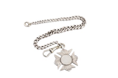 Lot 29 - AN ANTIQUE SILVER CURB BRACELET, with a medal...