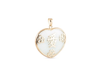 Lot 33 - A JADE PENDANT, on a 9ct yellow gold mount, in...