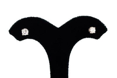 Lot 89 - A PAIR OF DIAMOND STUD EARRINGS, the round cut...