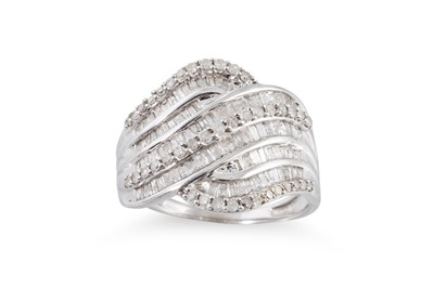 Lot 104 - A DIAMOND CLUSTER RING, the round and baguette...