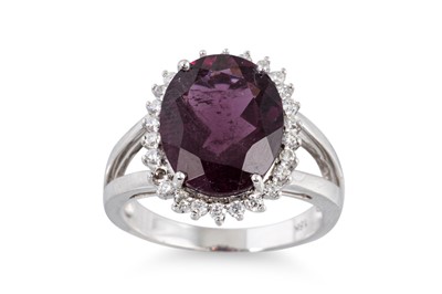 Lot 106 - A PINK TOURMALINE AND DIAMOND CLUSTER RING,...