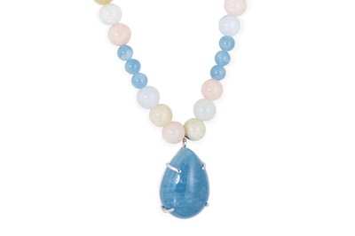 Lot 276 - A BEADED GEMSTONE NECKLACE, suspending a large...