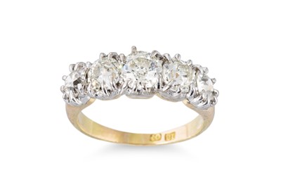 Lot 238 - A VINTAGE FIVE STONE DIAMOND RING, set with...
