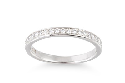 Lot 306 - A DIAMOND HALF ETERNITY RING, the brilliant...