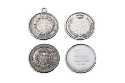 Lot 387 - A SET OF FOUR AGRICULTURAL SILVER MEDALS, from...