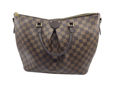 Lot 499 - A LOUIS VUITTON SIENA BAG, brown canvas with...