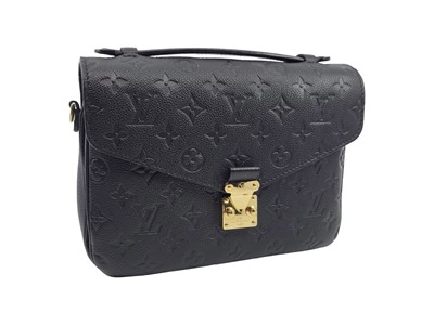 Lot 500 - A LOUIS VUITTON POCHETTE MÉTIS BLACK EMPREINTE,...
