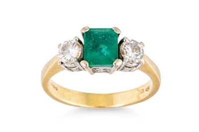 Lot 237 - A THREE STONE DIAMOND AND EMERALD RING,...