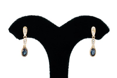 Lot 223 - A PAIR OF SAPPHIRE DROP EARRINGS, mounted in...