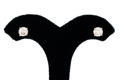 Lot 224 - A PAIR OF DIAMOND EARRINGS, the round...