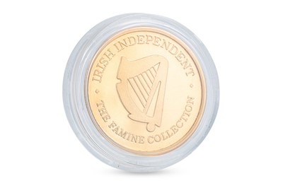Lot 409 - A 1995 1 OZ 9CT GOLD GREAT FAMINE MEDALLION,...