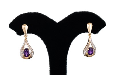 Lot 8 - A PAIR OF DIAMOND DROP EARRINGS, the oval...