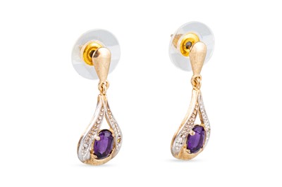 Lot 8 - A PAIR OF DIAMOND DROP EARRINGS, the oval...