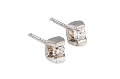 Lot 11 - A PAIR OF DIAMOND STUD EARRINGS, the round cut...