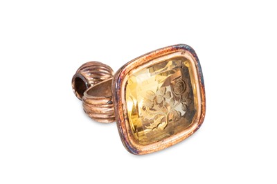 Lot 12 - AN ANTIQUE STONE SET SEAL, mounted in yellow...