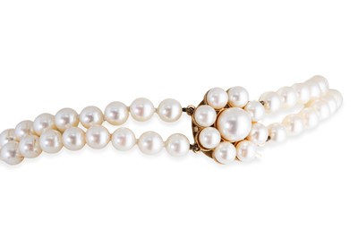 Lot 25 - A TWIN ROW CULTURED PEARL CHOKER, pearl set...