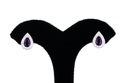 Lot 26 - A PAIR OF DIAMOND AND AMETHYST CLUSTER...
