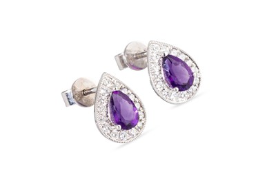 Lot 26 - A PAIR OF DIAMOND AND AMETHYST CLUSTER...