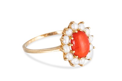 Lot 28 - A CORAL AND PEARL CLUSTER RING, the central...