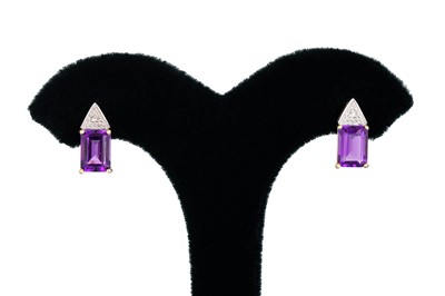 Lot 33 - A PAIR OF DIAMOND AND AMETHYST CLUSTER...