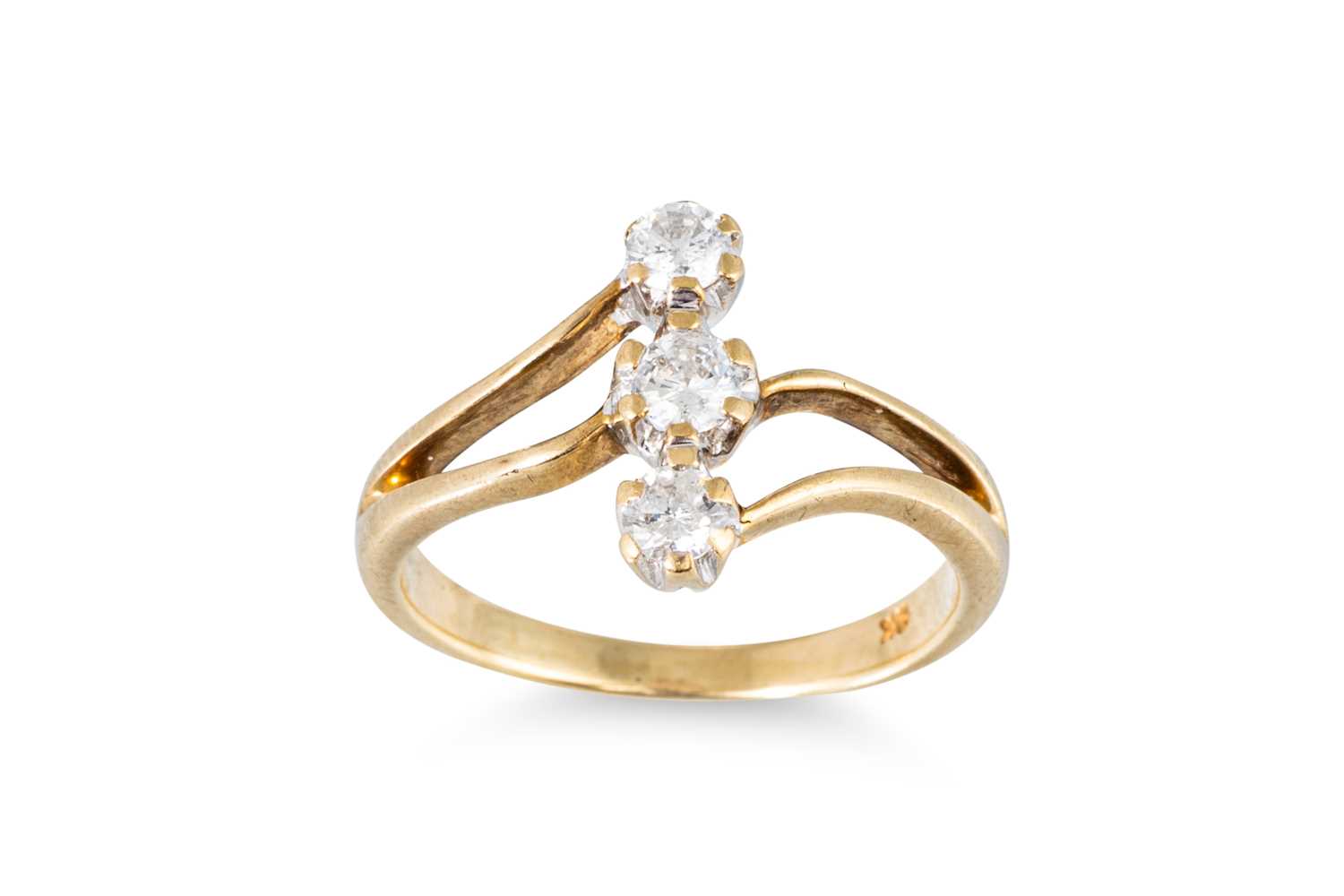 Lot 81 - A 9CT GOLD THREE STONE DIAMOND RING, up finger...