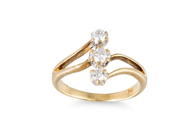 Lot 81 - A 9CT GOLD THREE STONE DIAMOND RING, up finger...