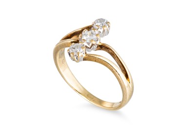 Lot 81 - A 9CT GOLD THREE STONE DIAMOND RING, up finger...