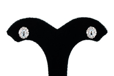 Lot 87 - A PAIR OF DIAMOND AND AQUAMARINE EARRINGS, the...