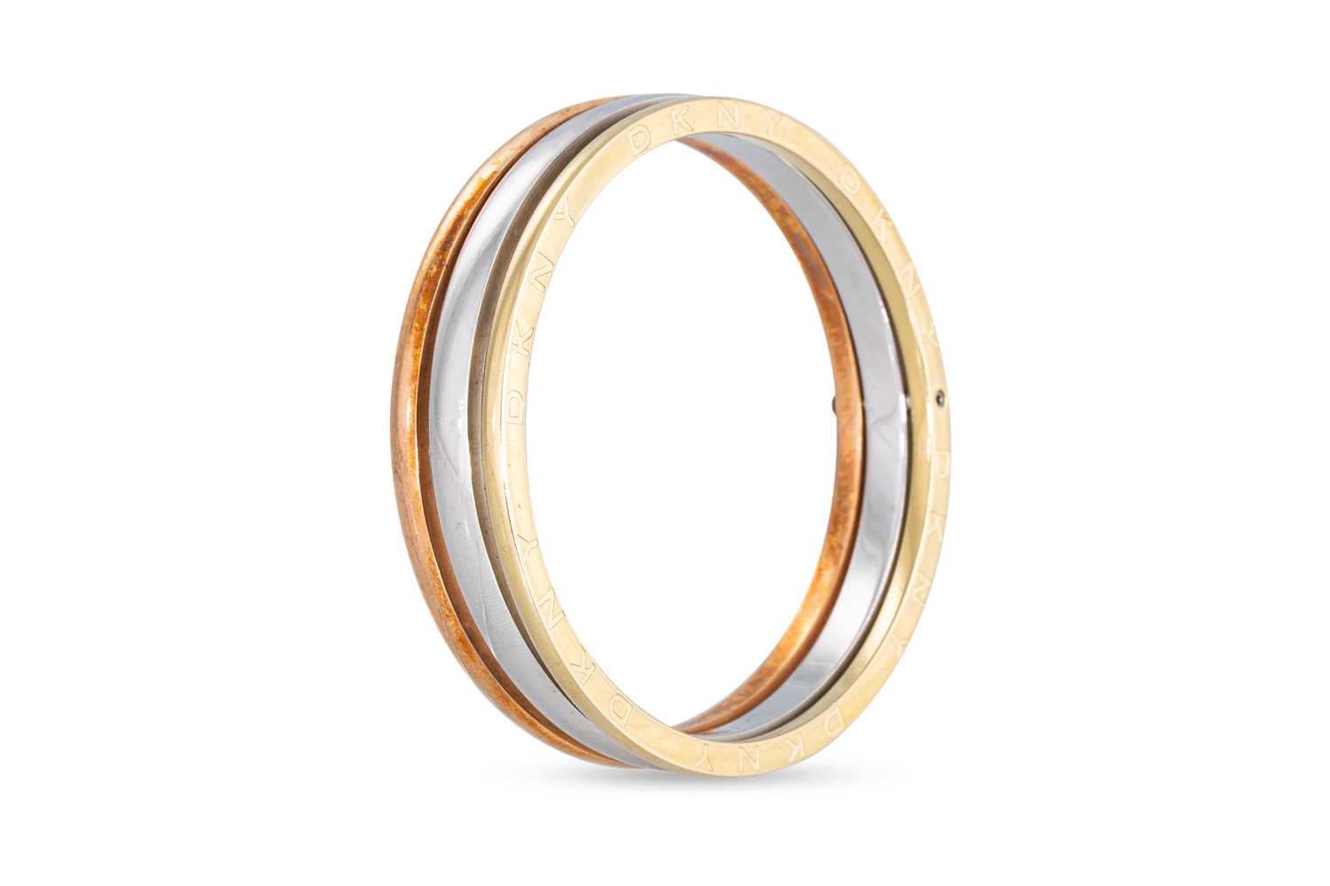 Lot 88 - A COSTUME JEWELLERY DKNY BANGLE