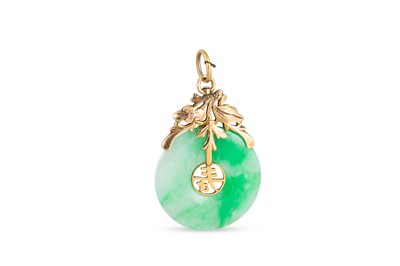 Lot 101 - A JADE PENDANT, mounted in 9ct yellow gold...
