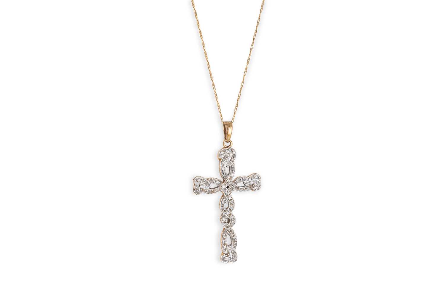 Lot 110 - A DIAMOND SET CROSS, mounted in 9ct gold, to a...