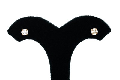 Lot 111 - A PAIR DIAMOND STUD EARRINGS, the round...
