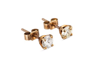 Lot 111 - A PAIR DIAMOND STUD EARRINGS, the round...