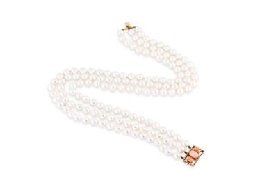 Lot 113 - A THREE STRAND CULTURED PEARL NECKLACE, the...