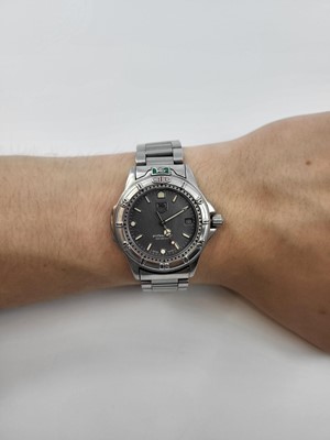 Lot 335 - A TAG HEUER BRACELET STRAP WRIST WATCH, grey...