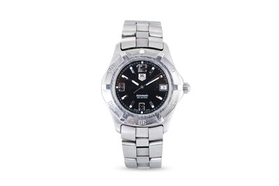 Lot 336 - A TAG HEUER AUTOMATIC WRIST WATCH, black dial...