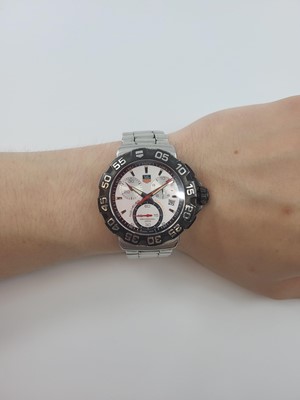 Lot 339 - A TAG HEUER MULTI-DIAL WRIST WATCH, with date,...