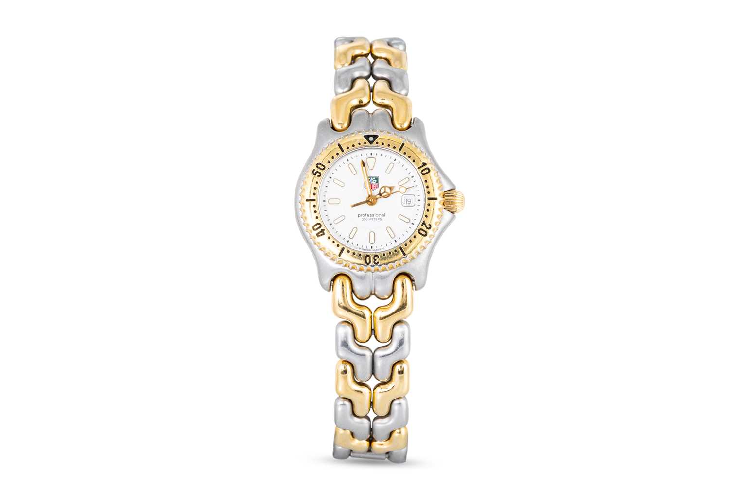 Lot 344 - A TAG HEUER WRIST WATCH, with date, white dial,...
