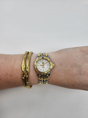 Lot 344 - A TAG HEUER WRIST WATCH, with date, white dial,...