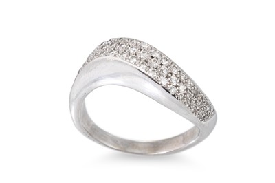 Lot 250 - A DIAMOND PAVÉ SET DRESS RING, of wavy form,...