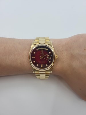 Lot 330 - A MIDSIZE 18CT GOLD ROLEX OYSTER PERPETUAL DAY-...