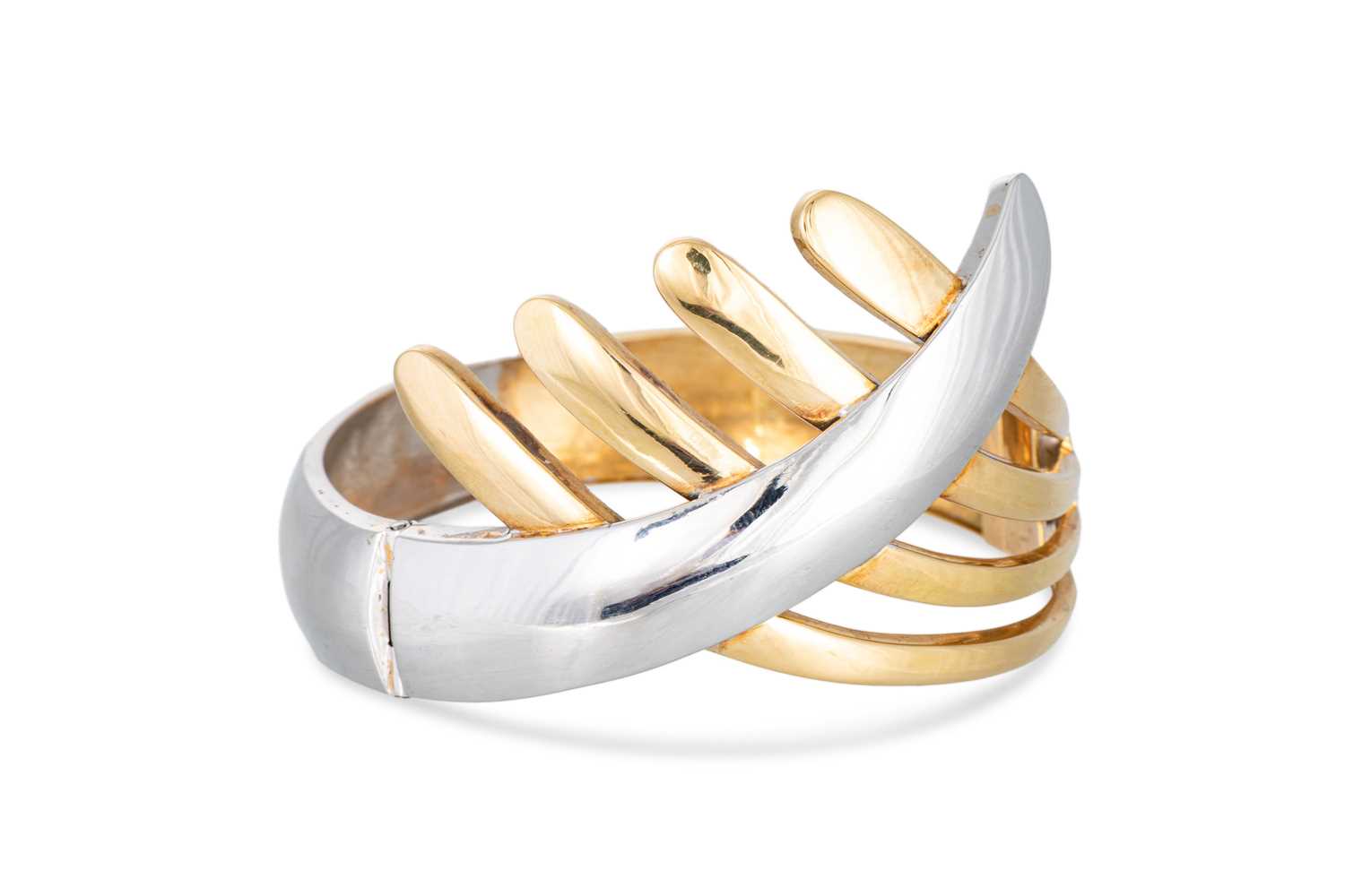 Lot 128 - AN 18CT YELLOW & WHITE GOLD BANGLE, hinged,...