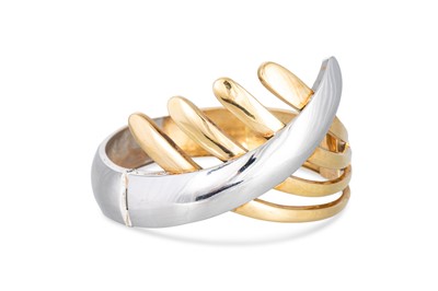 Lot 128 - AN 18CT YELLOW & WHITE GOLD BANGLE, hinged,...