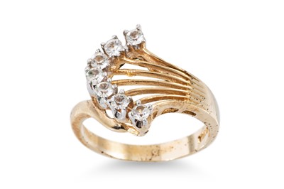 Lot 394 - A RETRO STONE SET RING, fan design, mounted in...