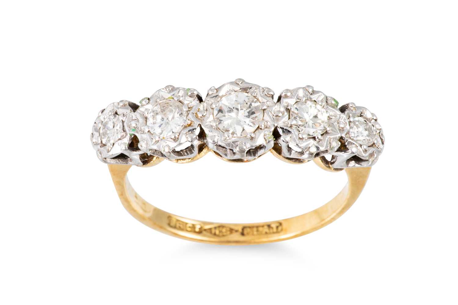 Lot 190 - A DIAMOND FIVE STONE RING, the round set...