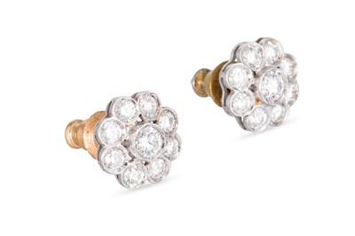 Lot 93 - A PAIR OF DIAMOND DAISY CLUSTER EARRINGS,...