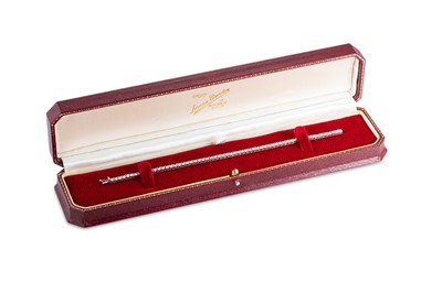 Lot 50 - A DIAMOND LINE BRACELET, the brilliant cut...