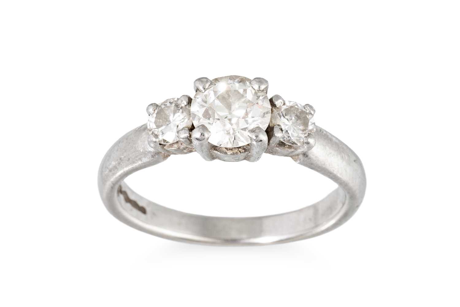 Lot 53 - A THREE STONE DIAMOND RING, mounted in...
