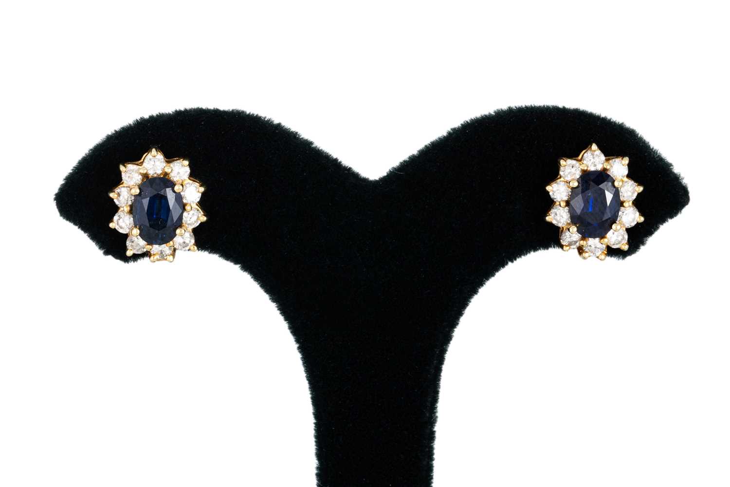 Lot 54 - A PAIR OF SAPPHIRE AND DIAMOND CLUSTER...