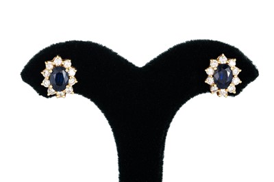 Lot 54 - A PAIR OF SAPPHIRE AND DIAMOND CLUSTER...